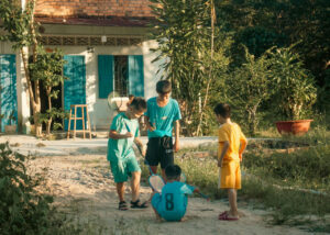 Kids working together on a craft project in a creative group setting